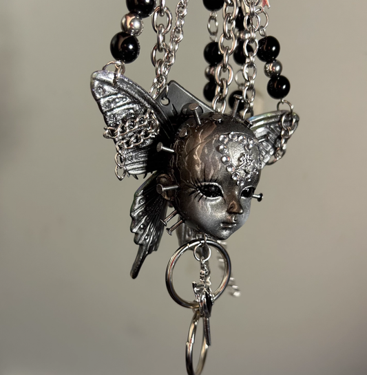 Metallic Butterfly Doll Head Necklace